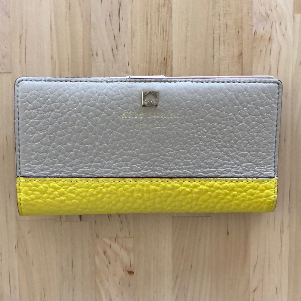 Bright yellow and tan Kate spade wallet